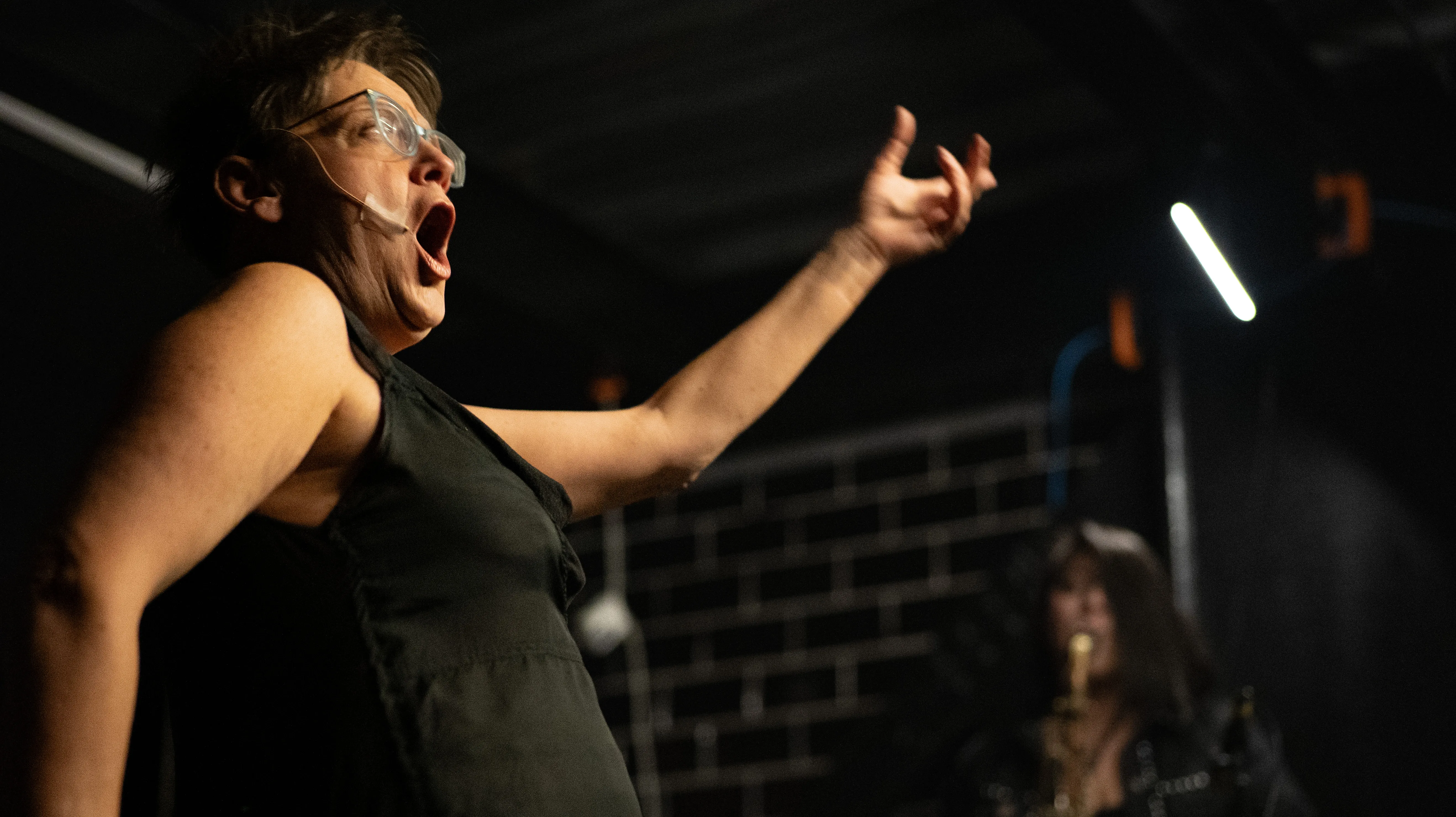 older woman screaming during a noise and improvised free jazz performance at 33 1/3, mexico city